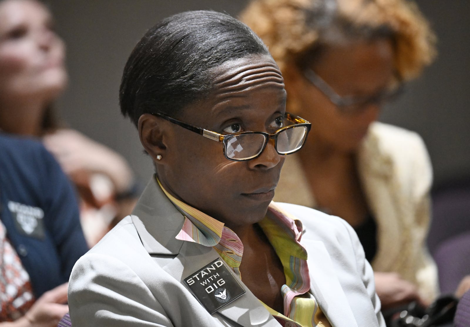 Inspector General Shannon Manigault sits among other attendees during the first meeting of a task force established to review the inspector general's authority at Atlanta City Hall, Tuesday, September 24, 2024, in Atlanta. The task force established to review the procedures of the Office of the Inspector General and Ethics Office met for the first time Tuesday. (Hyosub Shin / AJC)