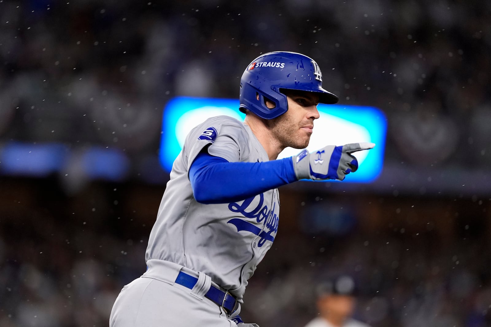 Los Angeles Dodgers' Freddie Freeman celebrates after hitting a two-run home run against the New York Yankees during the first inning in Game 4 of the baseball World Series, Tuesday, Oct. 29, 2024, in New York. (AP Photo/Godofredo A. Vásquez)