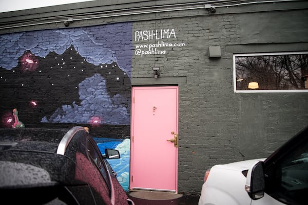 Parlor entrance through pink door off of Peters St SW.