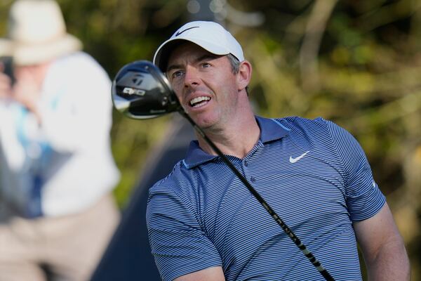 Rory McIlroy watches his tee shot on the 15th hole during the first round of The Players Championship golf tournament Thursday, March 13, 2025, in Ponte Vedra Beach, Fla. (AP Photo/Chris O'Meara)