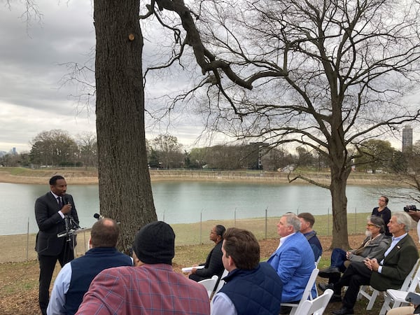 Mayor Andre Dickens speaks at an event celebrating the opening of a new plot of greenspace now open to the public in northwest Atlanta. (J.D. Capelouto/AJC)