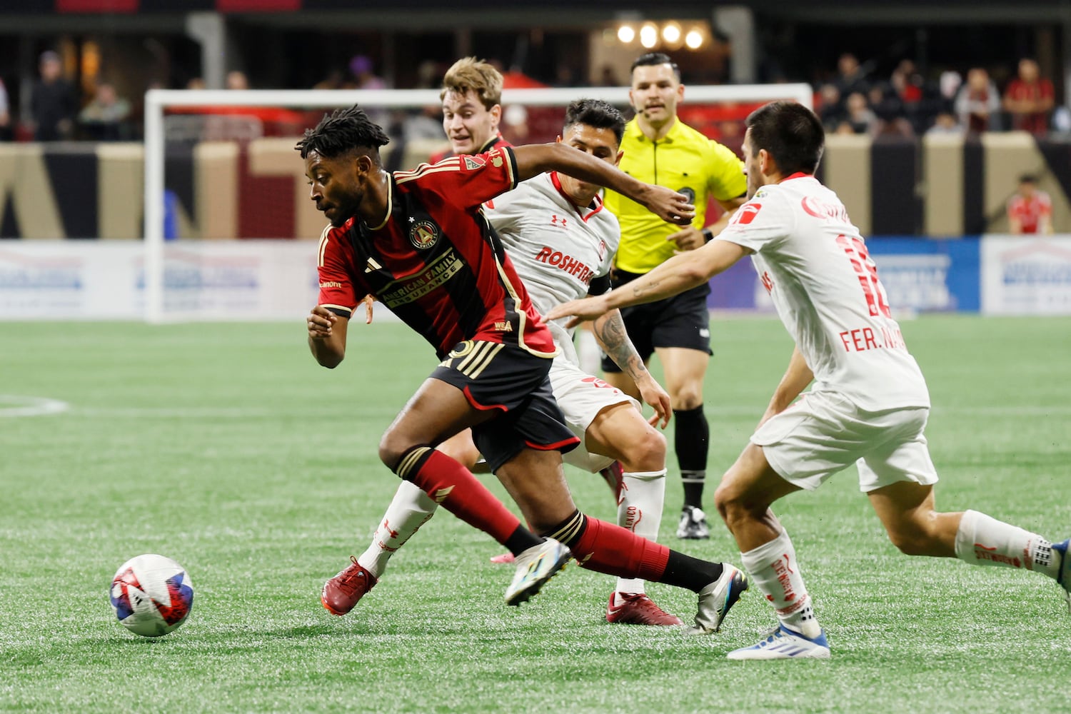 Atlanta United forward Tayler Young (53) breaks free from Toluca defenders during the second half against Liga MX Toluca of an exhibition match on Wednesday, Feb 15, 2023, in Atlanta. Miguel Martinez / miguel.martinezjimenez@ajc.com