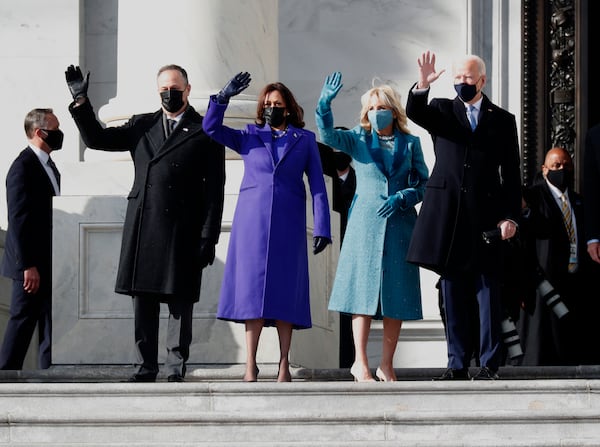 President Joe Biden, right, with first lady Jill Biden, second from right, Vice President Kamala Harris, second from left, and her husband Douglas Emhoff, arrive on the East Front of the U.S. Capitol on Wednesday. (Carolyn Cole/Los Angeles Times/TNS)