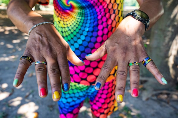 Michael Hills displays his colorful nail polish at the Pure Heat Community Festival in Piedmont Park on Sunday, Sept. 1, 2024.  (Olivia Bowdoin for the AJC).(Olivia Bowdoin for the AJC). 