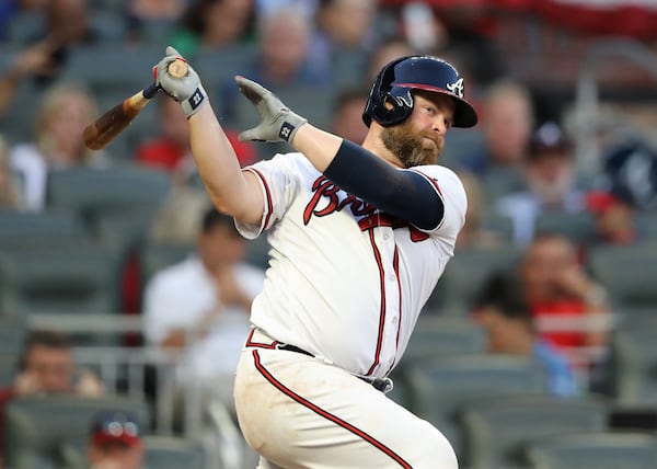 Braves catcher Brian McCann, who announced his retirement, hits a single in the fifth inning. Curtis Compton/ccompton@ajc.com