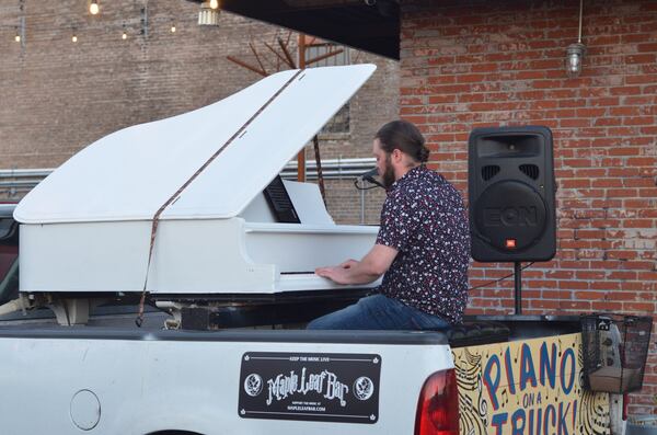 Colin Provensal performs in the beer garden at Zony Mash Beer Project as part of a Piano on a Truck gig. 
Courtesy of Wesley K.H. Teo