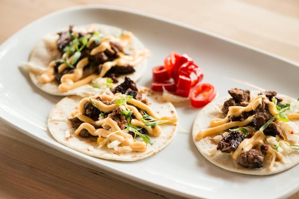  Food Truck Steak Tacos with kalbi-marinated steak, slaw, Sriracha aioli, chile and cilantro. Photo credit- Mia Yakel.