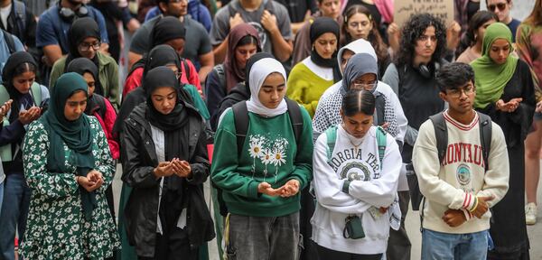 October 13, 2023 Atlanta: A student prayer rally "Solidarity with Palestine" occurred outside the student center on the Georgia Tech campus on Friday, Oct. 13, 2023 as Palestinians fled northern Gaza after Israel ordered 1-million to evacuate while Israeli ground attack looms. (John Spink / John.Spink@ajc.com) 

