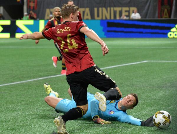 September 16, 2017 Atlanta - Atlanta United defender Julian Gressel (24) scores past Orlando City SC goalkeeper Joseph Bendik (1) in the first half of an MLS soccer match at the Mercedes-Benz Stadium on Saturday, September 16, 2017. HYOSUB SHIN / HSHIN@AJC.COM