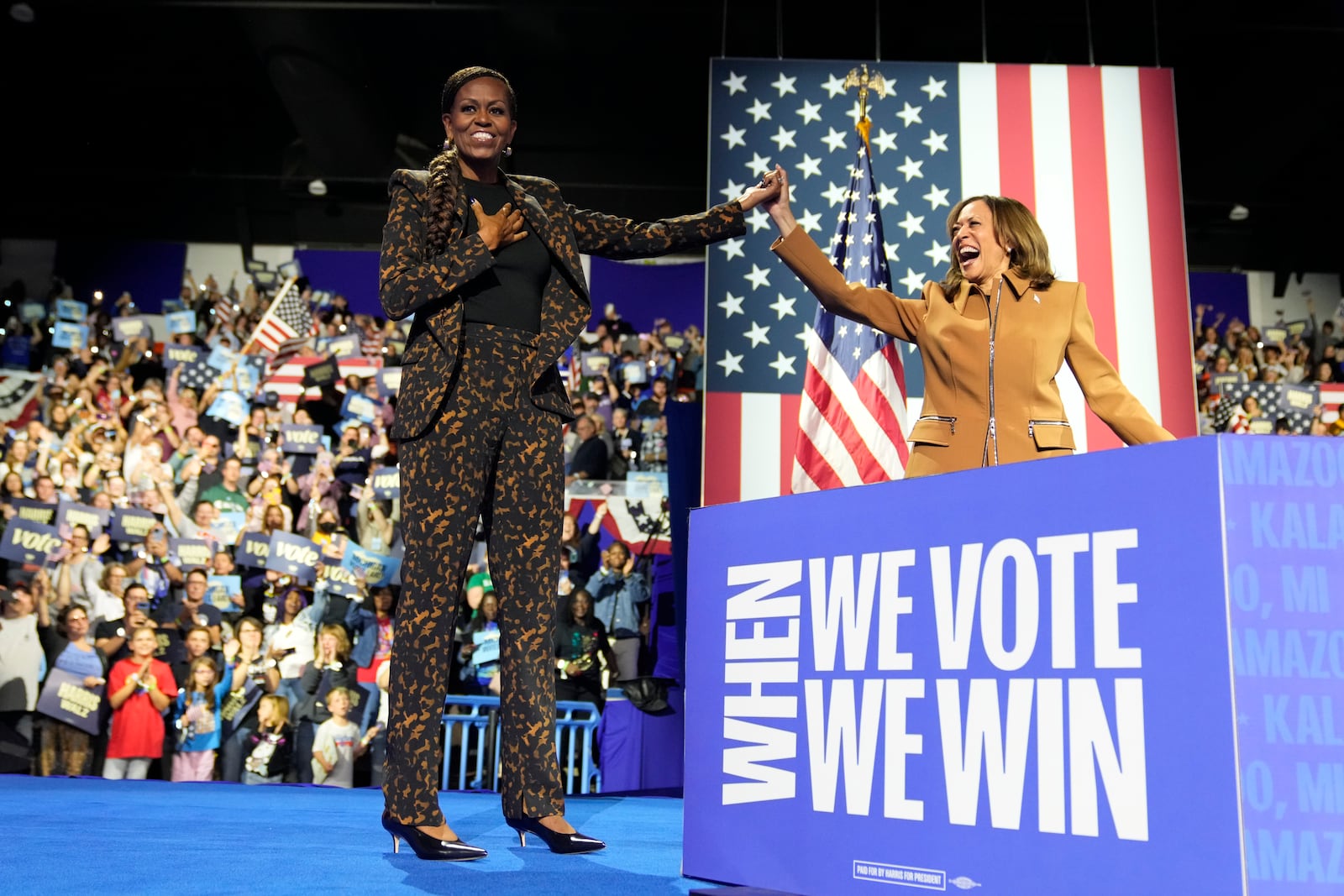 Former first lady Michelle Obama (left) campaigned for Vice President Kamala Harris in Michigan over the weekend.