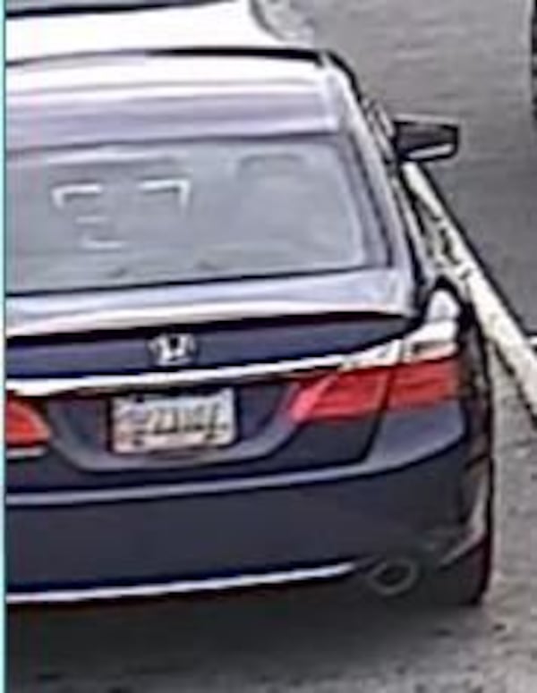 Gwinnett County cops say a male suspect accused of stealing $2,000 of high-end sunglasses from the Mall of Georgia on Nov. 4 and a woman were last seen driving away in this blue Honda Accord. (Photo: Gwinnett County Police Department)