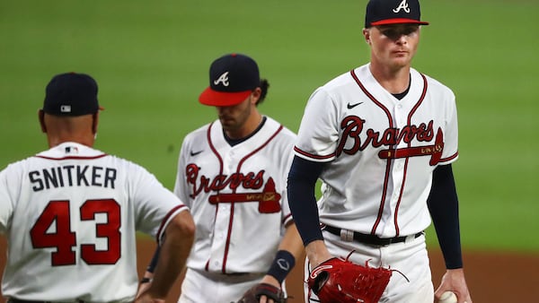 Atlanta traded pitcher Sean Newcomb (right) to the Cubs for former Braves righty Jesse Chavez and cash considerations. (Curtis Compton / ccompton@ajc.com)