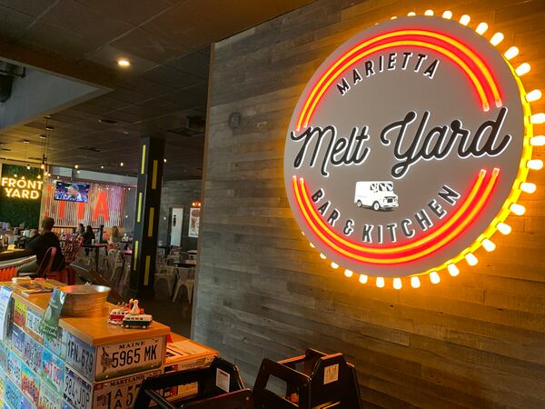 Marietta Melt Yard is a neighborhood eatery with a blend of a food truck, a carnival and a beer garden, according to managing partner Justin Wilfon. RODNEY HO/rho@ajc.com