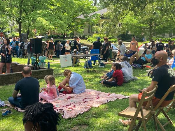 Neighbors listen to Tuesday Nights Live during the first Virginia Highland Porchfest. 
Courtesy Virginia Highland District