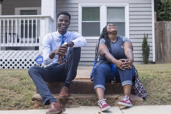 Carver S.T.E.A.M. student China Monae Bailey, right, speaks with her mentor and neighbor Aaron Doctor outside of their houses in Atlanta’s Capital View neighborhood, Wednesday, Sept. 26, 2018. Doctor, originally from South Carolina, is a fourth year Medical Student at Morehouse School of Medicine. Bailey aspires to become a nurse. “I want to be a resource for bright young aspiring health professionals,” Doctor said. (ALYSSA POINTER/ALYSSA.POINTER@AJC.COM)