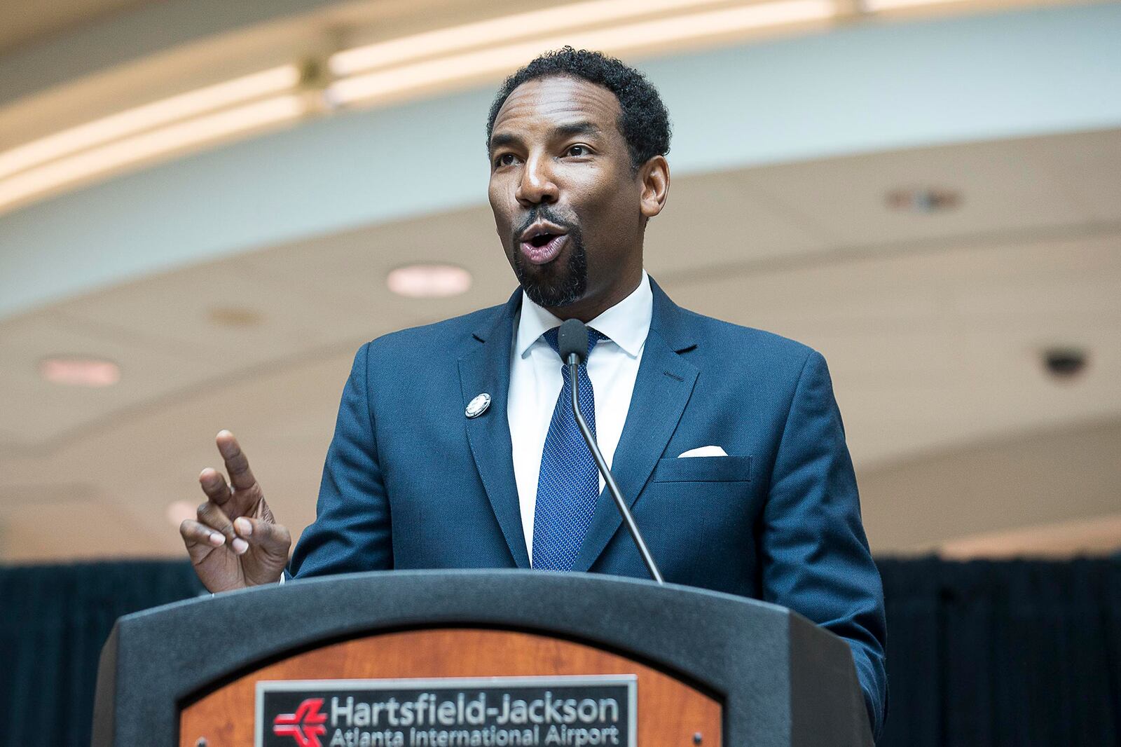 04/08/2019 -- Atlanta, Georgia -- Atlanta City Council member Andre Dickens speaks during a tribute to Congressman John Lewis in the atrium of the domestic terminal at Atlanta's Hartsfield Jackson International Airport, Monday, April 8, 2019. The art exhibit "John Lewis-Good Trouble" was unveiled Monday with historical artifacts, audio and visual installations and tributes to the congressman.  