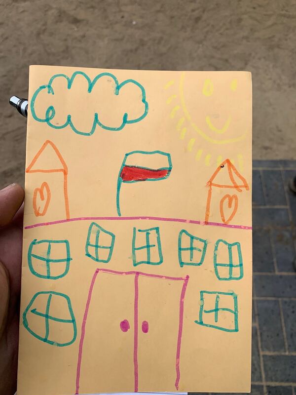 As the Habitat for Humanity group wrapped up its work in Poland, Veronika Kawka, 8, presented each of the volunteers with a handmade card. On the front, she sketched a picture of her new house, complete with a Polish flag proudly flapping in the wind; inside, she wrote each of the volunteers’ names and drew a picture of a heart. Over the past two years, Habitat for Humanity volunteers from seven different countries have helped build a two-story house for the Kawka family. The Kawkas currently live in a small, one-room house in the Polish village of Redzynskie. MARK A. WALIGORE / MARK.WALIGORE@AJC.COM