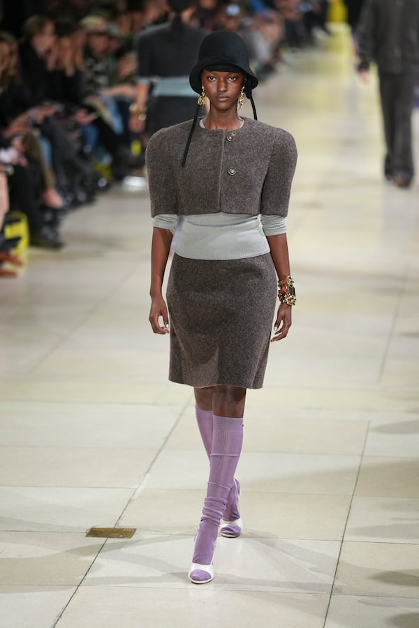 A model wears a creation as part of the Miu Miu Fall/Winter 2025-2026 Womenswear collection presented Tuesday, March 11, 2025. in Paris. (Photo by Scott A Garfitt/Invision/AP)