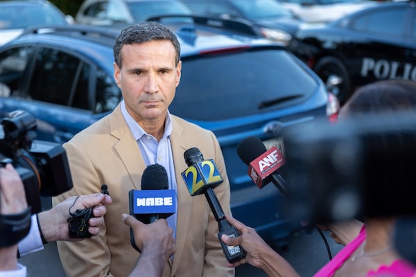 Craig Goodmark, attorney for Cobb teacher Katie Rinderle, speaks to media after a Cobb County school board meeting in Marietta on Thursday, Aug. 17, 2023. The school board voted to fire Rinderle, who read a book that challenges gender norms to fifth grade students. (Arvin Temkar / arvin.temkar@ajc.com)