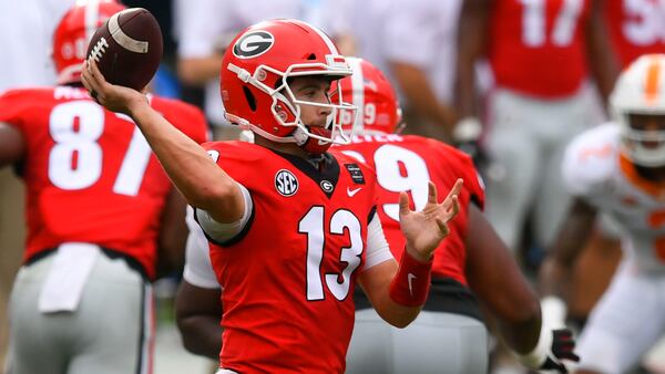 Georgia quarterback Stetson Bennett  passes against Tennessee during the first half Saturday, Oct. 10, 2020, at Sanford Stadium in Athens. (John Amis/For the AJC)