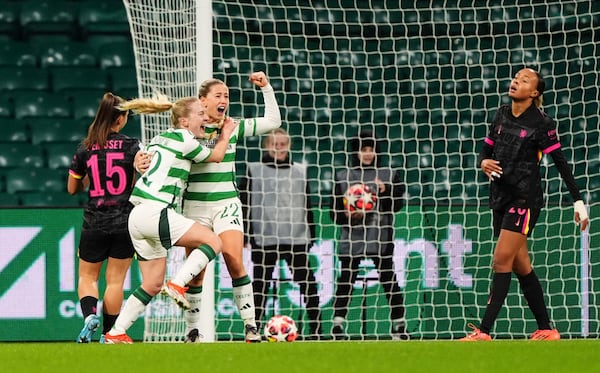 Celtic's Murphy Agnew, center, celebrates scoring her side's first goal of the game, during the Women's Champions League, group B soccer match between Celtic Women and Chelsea Women, at Celtic Park, Glasgow, Scotland, Wednesday Nov. 13, 2024. (Andrew Milligan/PA via AP)