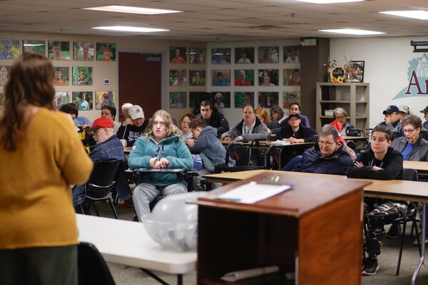 Residents of Annandale Village meet for their morning meeting. (Natrice Miller/ Natrice.miller@ajc.com)