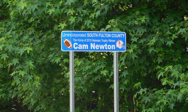 A commemorative sign near Cam Newton's alma mater, Westlake High School in southwest Atlanta. JENNIFER BRETT / JBRETT@AJC.COM