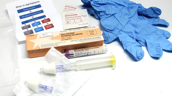 This May 13, 2015, file photo shows the contents of a drug overdose rescue kit at a training session on how to administer naloxone, a drug which reverses the effects of heroin and prescription painkiller overdoses.