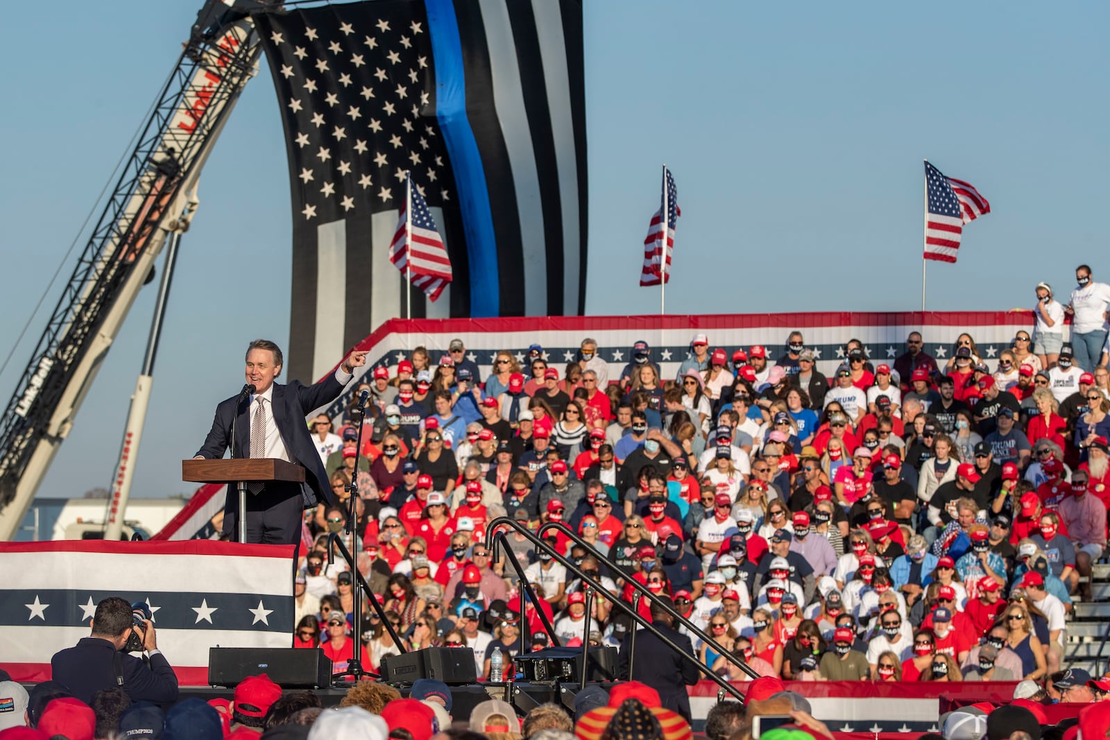 10/16/2020 -Macon, Georgia - U.S. Republican Senator David Perdue makes remarks at a President Donald Trump rally at Middle Georgia Regional Airport in Macon, Friday, October 16, 2020.  (Alyssa Pointer / Alyssa.Pointer@ajc.com)