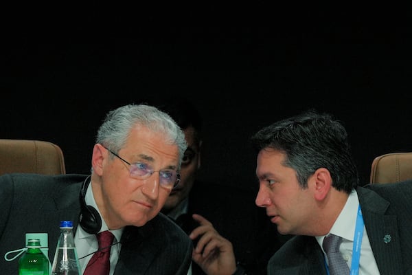 Mukhtar Babayev, COP29 President, left, and Yalchin Rafiyev, Azerbaijan's COP29 lead negotiator, speak during a plenary session at the COP29 U.N. Climate Summit, Thursday, Nov. 21, 2024, in Baku, Azerbaijan. (AP Photo/Peter Dejong)