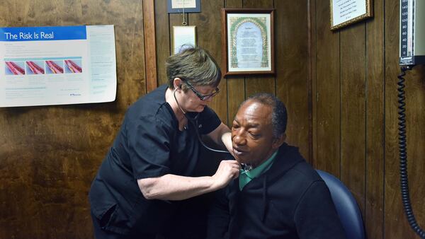 Dr. Karen Kinsell checks her patient Jimmie Fair at Clay County Medical Center in Fort Gaines on Thursday, October 19, 2017.