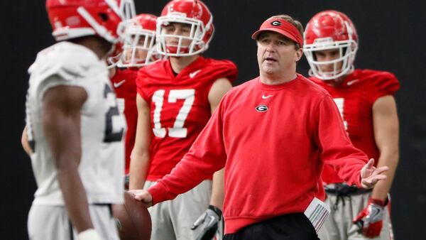  Georgia head coach Kirby Smart directs practice today.   Georgia traveled back to their facilities at  Butts-Mehre Heritage Hall for practice on Saturday.   Georgia plays Alabama in the College Football Playoffs final at Mercedes Benz Stadium in Atlanta on Monday night.  BOB ANDRES  /BANDRES@AJC.COM