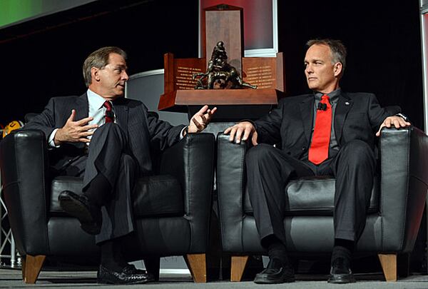 November 30, 2012 Atlanta: Alabama head coach Nick Saban, left, and Georgia head coach Mark Richt answered questions during the SEC Championship coaches luncheon at the Hyatt Friday afternoon November 30, 2012. Alabama and Georgia square off in the SEC Championship at the Georgia Dome on Saturday. BRANT SANDERLIN / BSANDERLIN@AJC.COM "Take it from me, Mark. Nice guys lose to Auburn." (Brant Sanderlin/AJC photo)