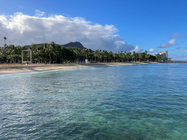 The majestic Diamond Head crater towers over the blue Pacific waters of Waikiki Beach.
(Courtesy of H.M. Cauley)