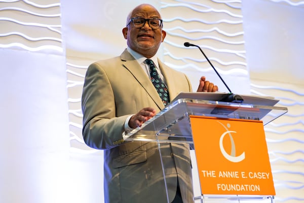 Kweku Forstall, Director of the Annie E. Casey Foundation's Atlanta Civic Site, speaks as the organization issues its 2024 Changing the Odds Report. The organization looks at the issue of racial inequality in Atlanta and proposes solutions. (Olivia Bowdoin for the AJC).