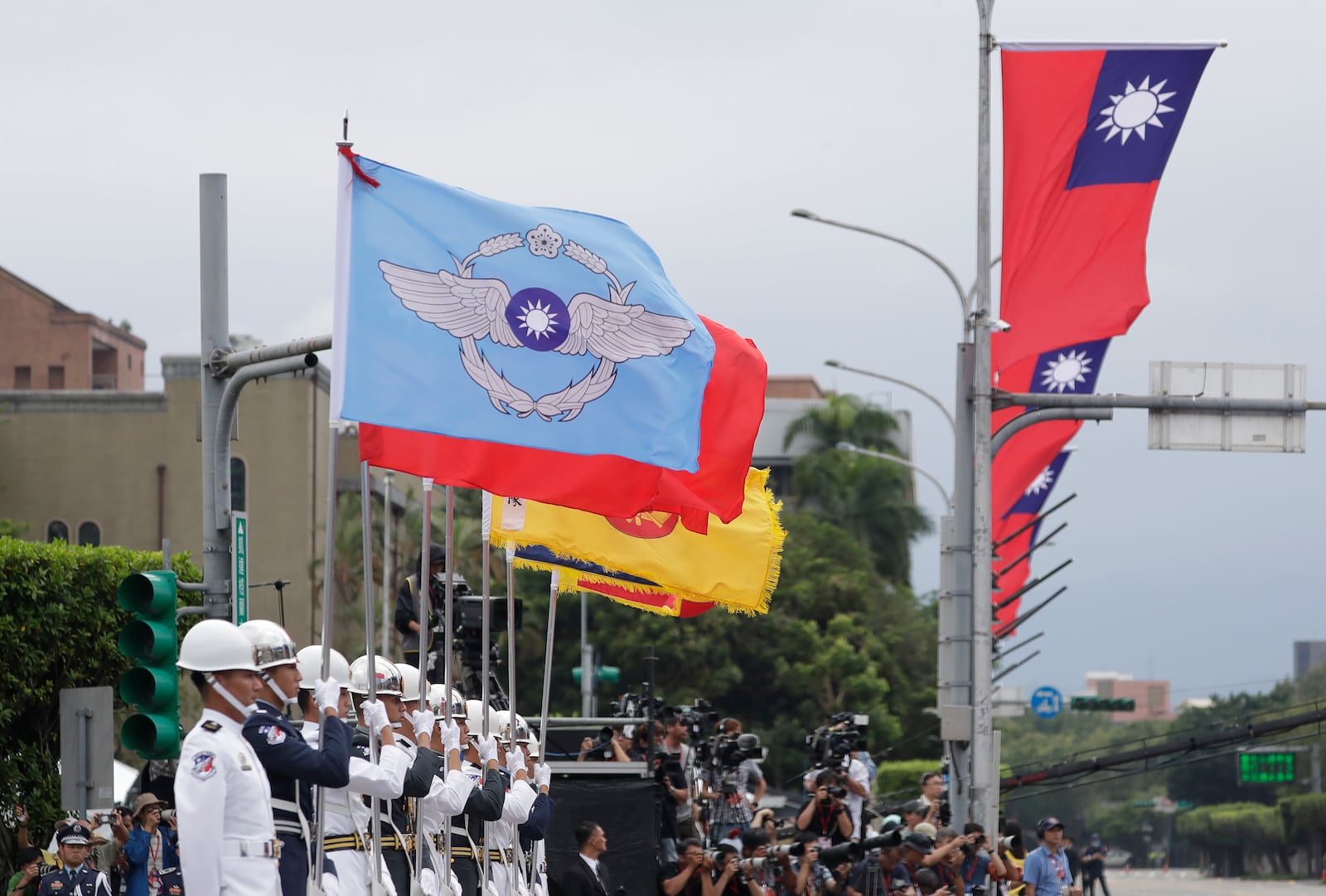 A military honor guard attends National Day celebrations in front of the Presidential Building in Taipei, Taiwan, Thursday, Oct. 10, 2024. (AP Photo/Chiang Ying-ying)