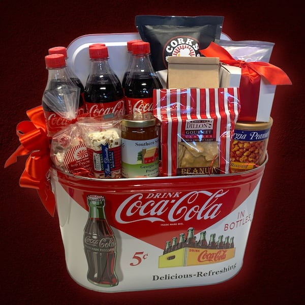 Peach State fans will appreciate gifts such as Coca-Cola baskets, games and souvenirs from Georgia Gifts and More. Courtesy of Georgia Gifts and More