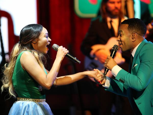 John Legend and a backup singer get into the swing of the holidays at the Fox Theatre. Photo: Robb Cohen Photography & Video /RobbsPhotos.com