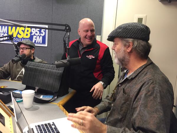 Boss Pete Spriggs dropped by to congratulate Eric Von Haessler on his first weekday show. CREDIT: Rodney Ho/ rho@ajc.com