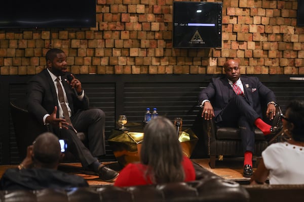 Republican U.S. Rep. Byron Donalds of Florida, left, speaks as Republican U.S. Rep. Wesley Hunt of Texas listens during an event at The Cigar Code in Philadelphia. The Republican Party is trying to make inroads with Black voters, a key demographic for Democrats that could swing the 2024 election. (Heather Khalifa/The New York Times)
                      