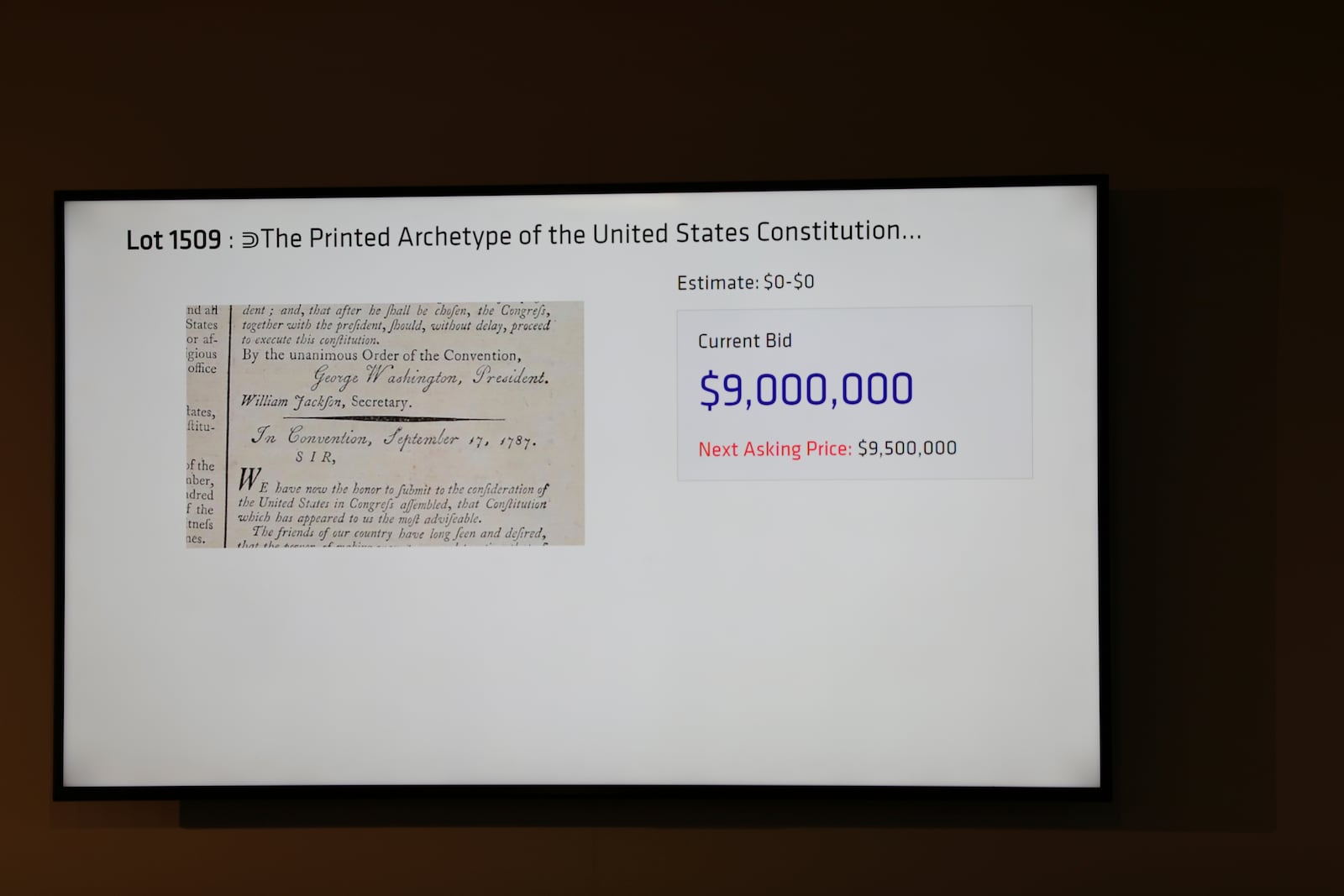 Part of a 1787 copy of the U.S. Constitution that sold for $9 million is displayed on a screen at Brunk Auctions in Asheville, N.C., on Thursday, Oct. 17, 2024. (AP Photo/Jeffrey Collins)