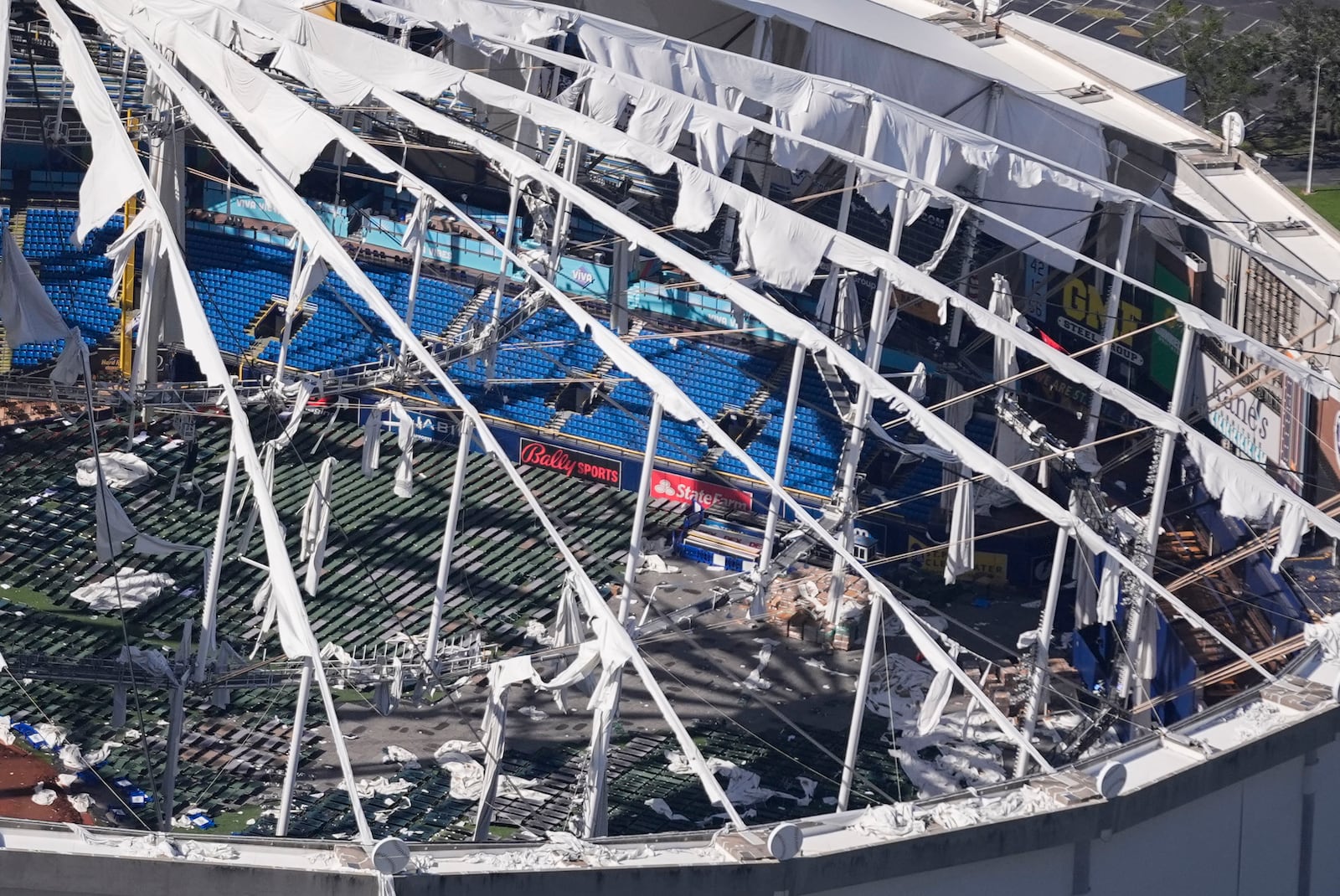 The destroyed roof of the Tropicana Dome is seen in the aftermath of Hurricane Milton, Thursday, Oct. 10, 2024, in St. Petersburg, Fla. (AP Photo/Gerald Herbert)