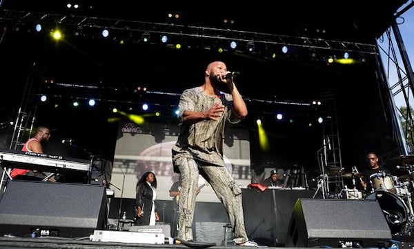 Common performs with key boards Robert Glasber, left and drummer, beat maker Karriem Riggins as the trio August Greene at the ONE Music Fest at Central Park, Sunday, September 9, 2018. (Akili-Casundria Ramsess/Eye of Ramsess Media