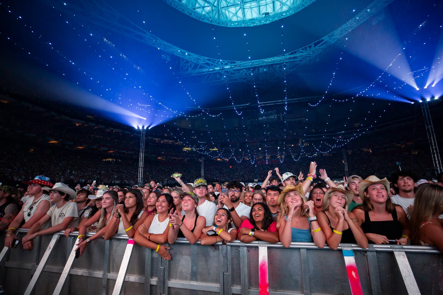 Atlanta, Ga: Zach Bryan played to a sold-out crowd of cowboy hat-clad fans who sang along with every word. Photo taken Saturday August 10, 2024 at Mercedes Benz Sadium. (RYAN FLEISHER FOR THE ATLANTA JOURNAL-CONSTITUTION)