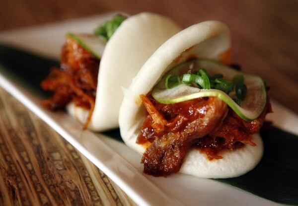 Pulled pork steamed buns at Kapow! Noodle Bar. ( (Bruce R. Bennett/The Palm Beach Post) 