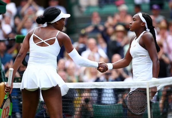  Cori Gauff of the United States shakes hands at the net with Venus Williams of The United States after her Ladies' Singles first round match against Venus Williams of The United States during Day one of The Championships - Wimbledon 2019 at All England Lawn Tennis and Croquet Club on July 01, 2019 in London, England. (Photo by Clive Brunskill/Getty Images)