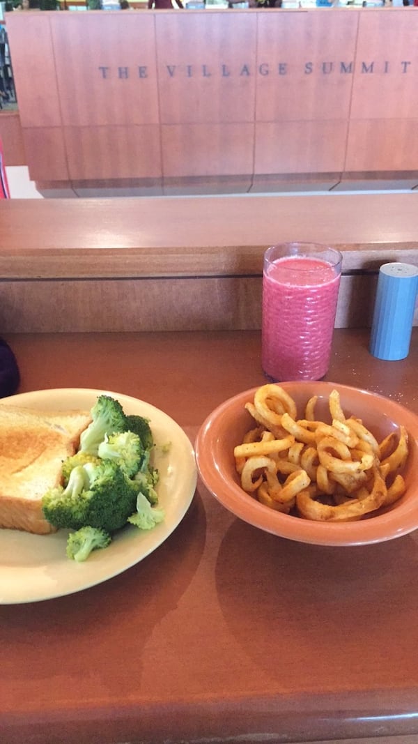 A meal of grilled cheese, broccoli, curly fries and a fruit smoothie was enjoyed by writer Bill King's daughter at the Village Summit dining hall, spring semester 2016. Courtesy of Olivia King