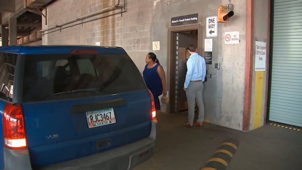 This is a screen grab from video of former DeKalb County Commissioner Sharon Barnes Sutton leaving federal court on Tuesday, May 21, 2019, after being released from custody on a $25,000 unsecured bond. Sutton pleaded not guilty to charges that she took $1,000 from a subcontractor working on a lucrative project in DeKalb. The indictment describes a company that worked on a job awarded the same time as Tetra Tech was give the construction-management contract at the Snapfinger Advanced Wastewater Treatment Plant. CHANNEL 2 ACTION NEWS/WSB