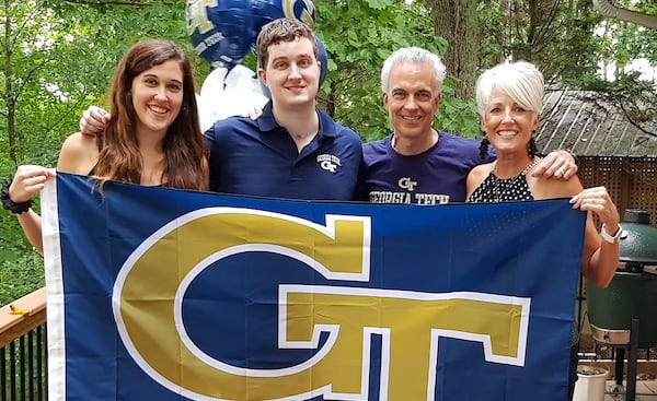 Clark Jacobs (second from left) with his family, including sister Kelsey, and parents Ron and Mariellen, at the family's Cobb County home in July 2020. 