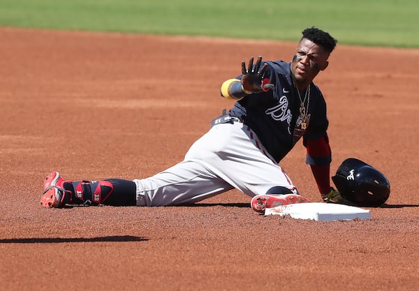 Atlanta Braves outfielder Ronald Acuna calls time after reaching second base on a leadoff double in the first inning Monday, March 1, 2021, against the Boston Red Sox as JetBlue Park in Fort Myers, Fla. (Curtis Compton / Curtis.Compton@ajc.com)